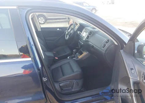 2014 Volkswagen Tiguan Sel z USA, uszkodzony, nr VIN WVGAV3AX7EW626003